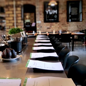 restaurant table with written tests at each seat