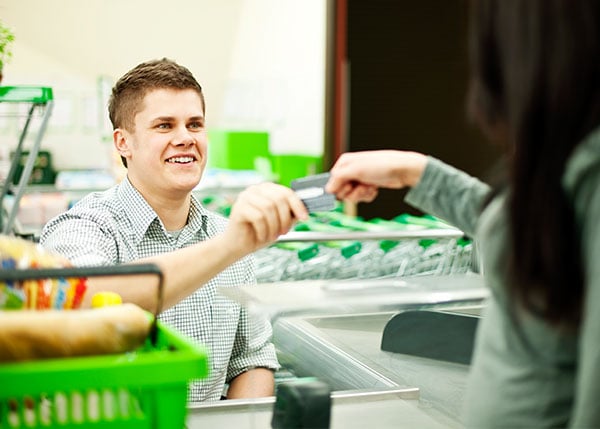 cashier working at a grocery store
