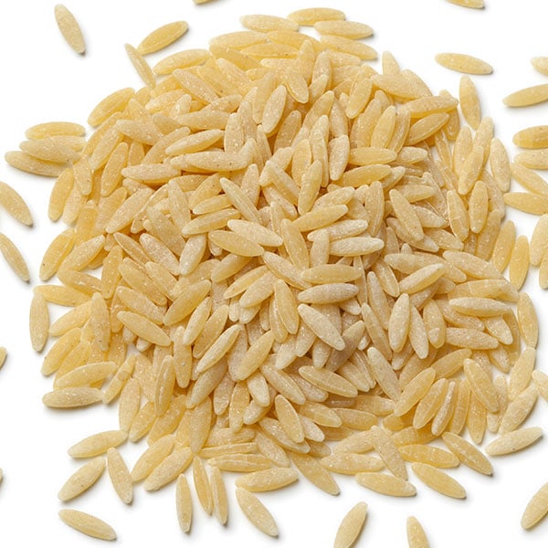 Close up of dry orzo pasta