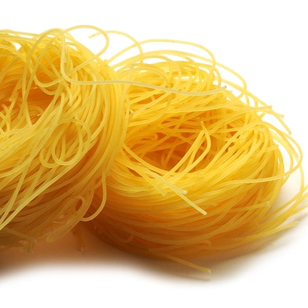 Close up of dry capellini pasta