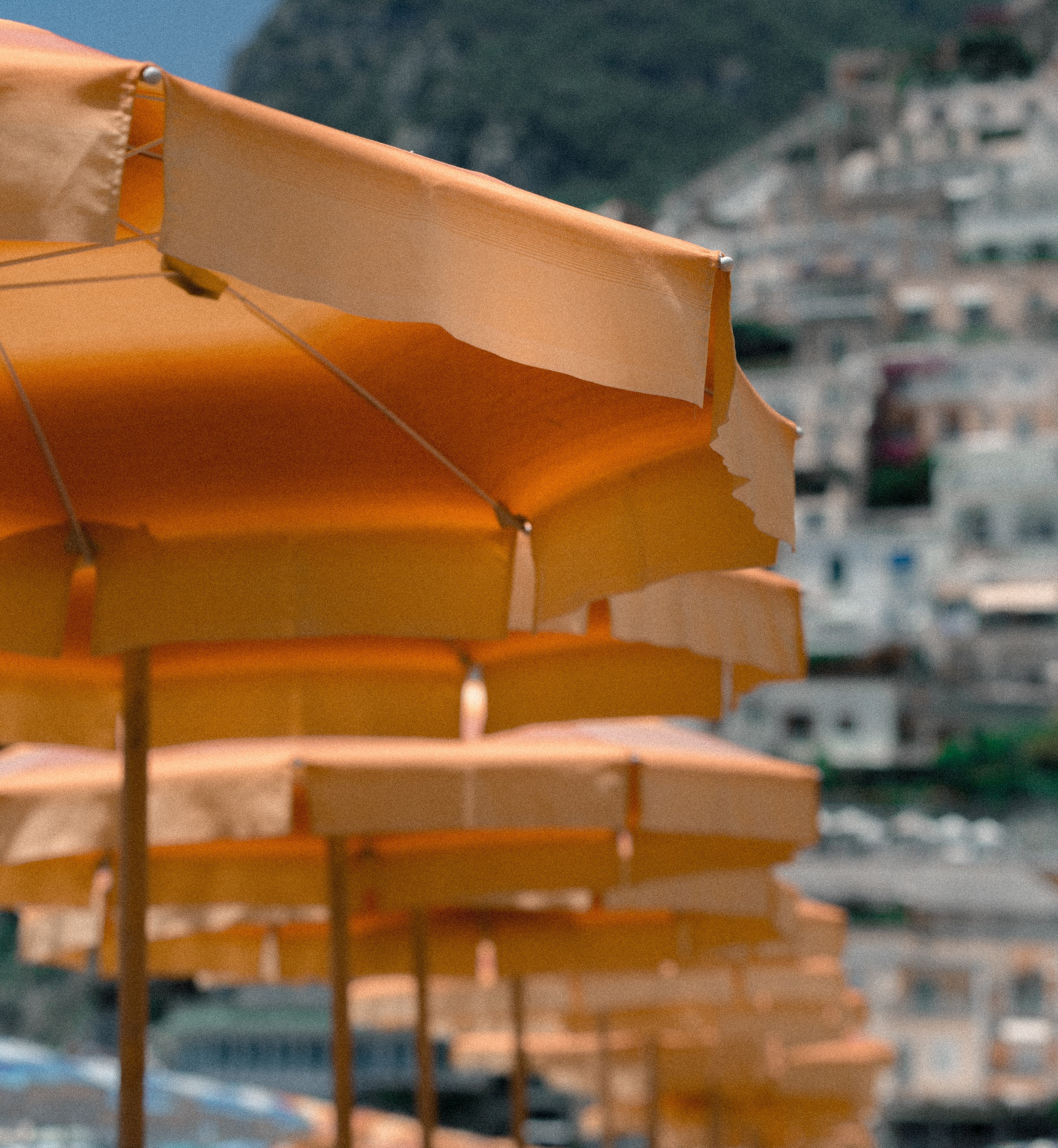 Umbrellas with matching orange canopies