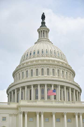 state capital building with American flag