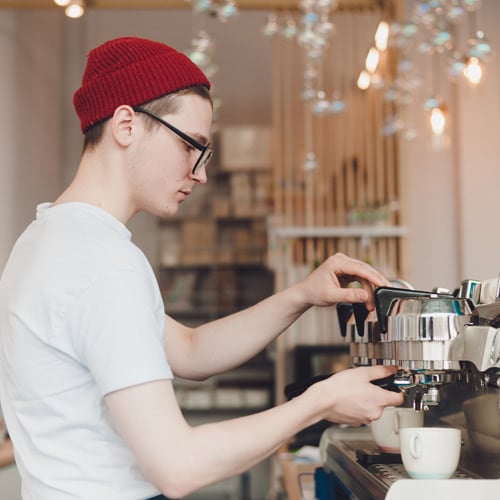 Barista making a cappuccino