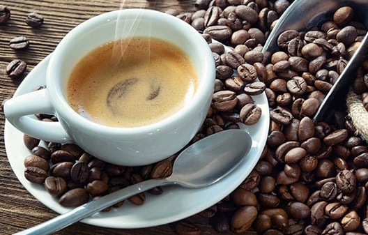 Image of coffee cup and coffee beans